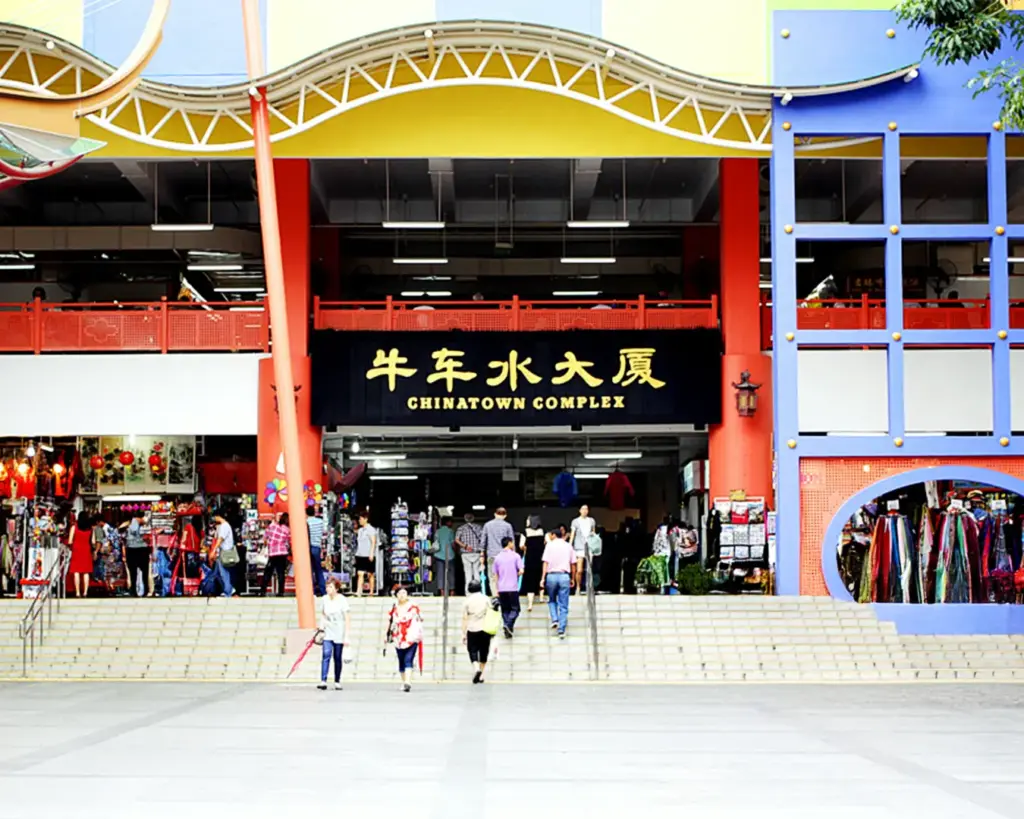 Exterior view of Chinatown Complex Food Centre in Singapore, a bustling hawker centre famous for its wide variety of affordable local dishes and vibrant food culture.