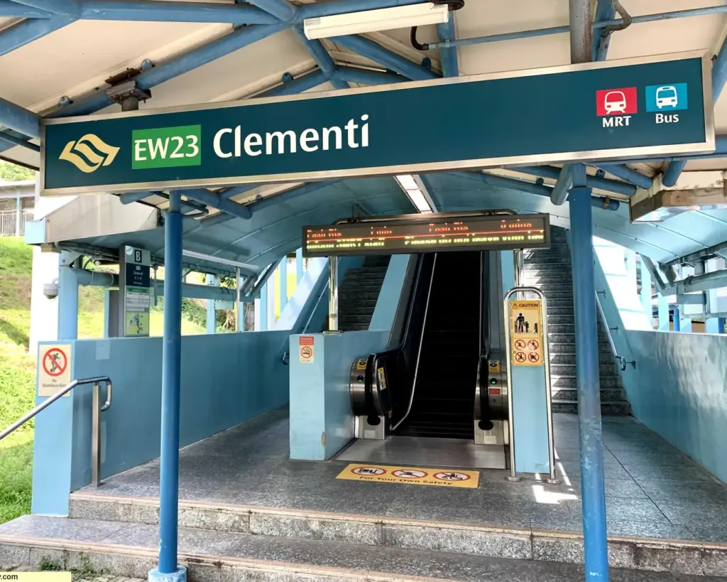 Entrance to Clementi MRT station with blue signage showing "EW23 Clementi," escalator, stairs, and transit icons for MRT and bus.
