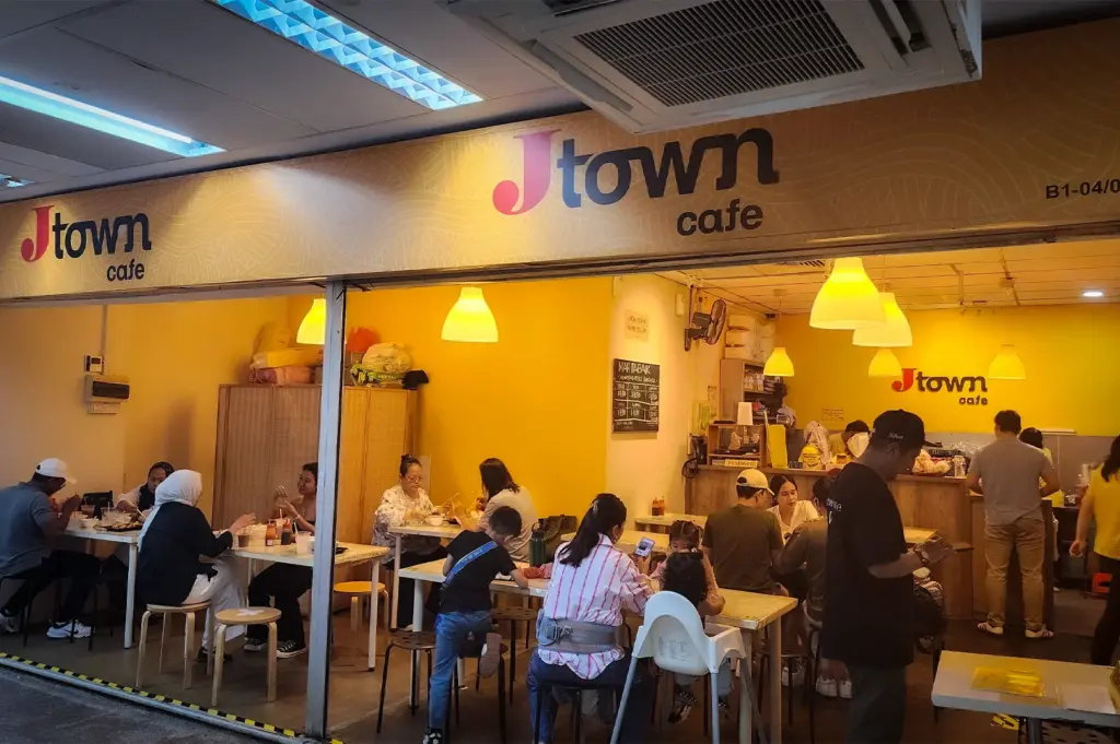 Front view of Jtown Cafe in Singapore with customers dining inside the casual Japanese-style eatery
