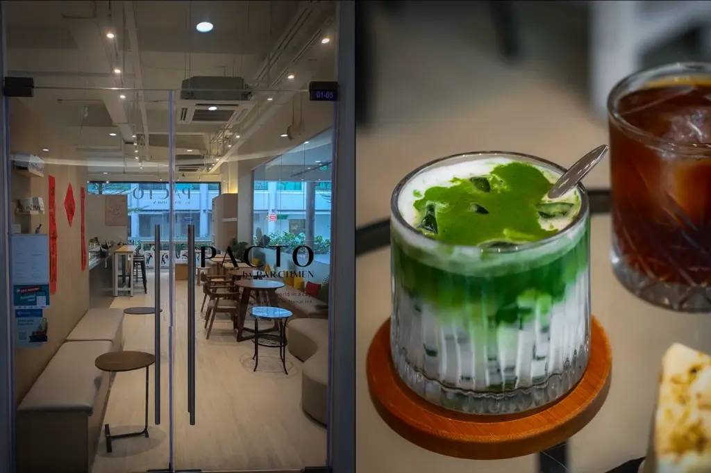 Front entrance and minimalist interior of Pacto by Parchmen cafe in Singapore featuring light wood decor, modern seating, and bright natural lighting
