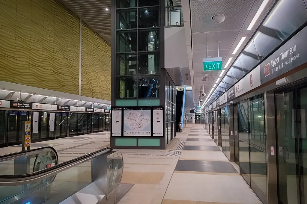 Upper Thomson MRT Station on Singapore's Thomson-East Coast Line, featuring spacious underground platforms, platform screen doors, escalators, and modern transit infrastructure.