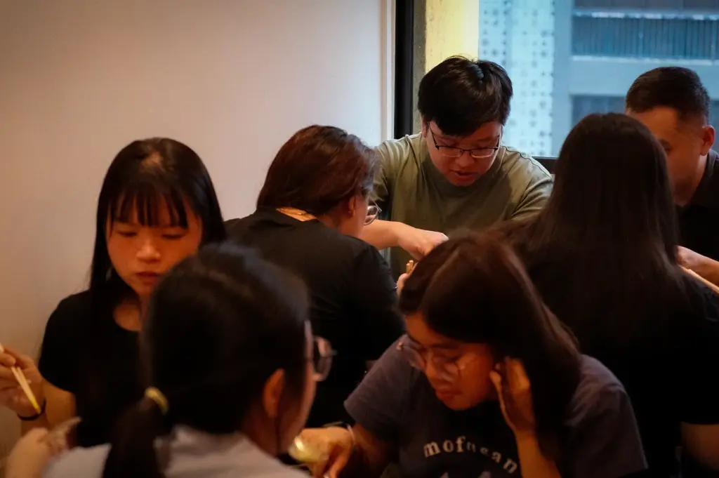 Diners enjoying a meal together at Soup Curry by Ki Setsu in Singapore.